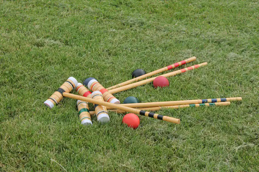 Croquet Schläger und Kugeln als klassisches Gartenspiel für Erwachsene